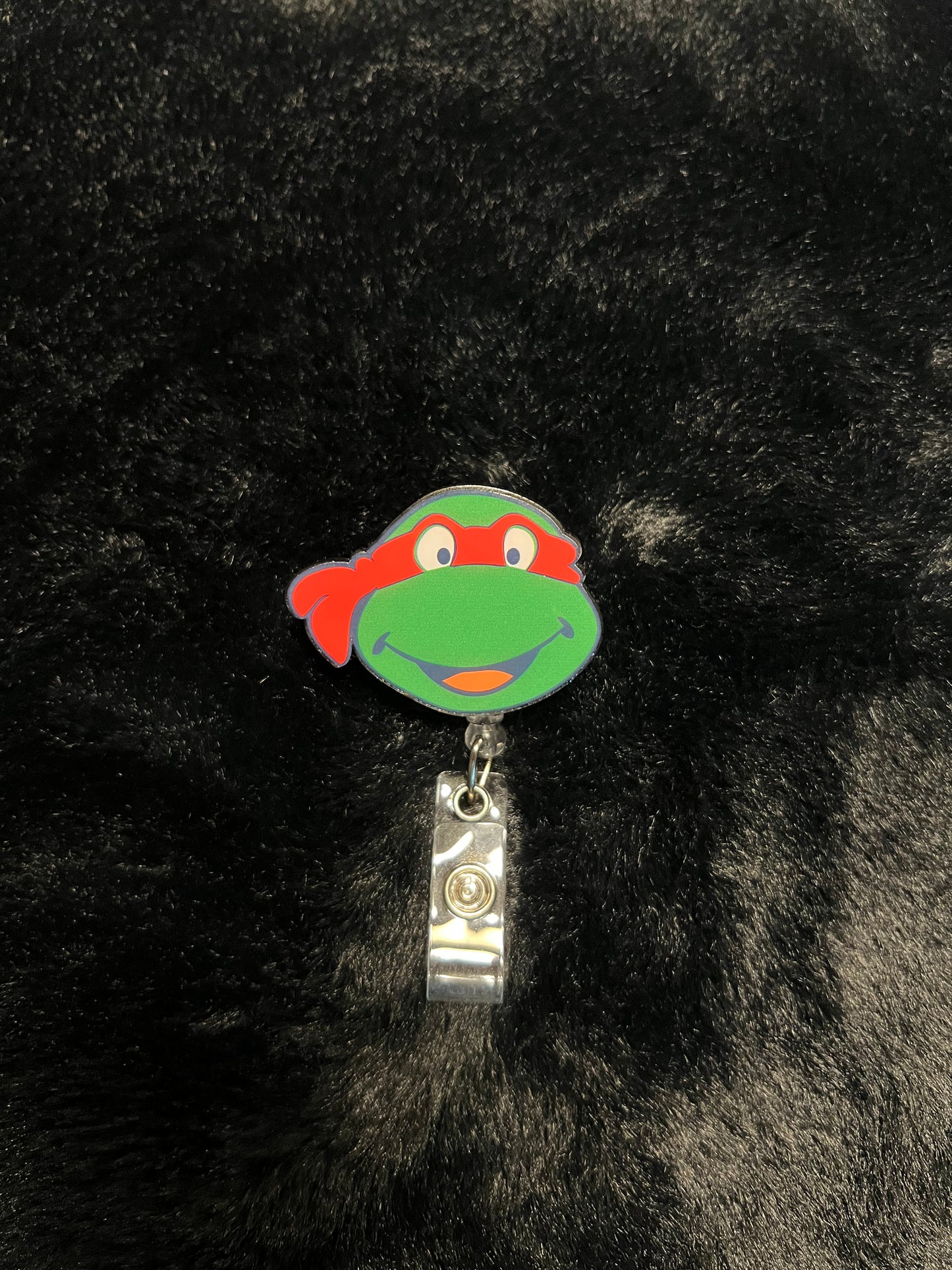 Red Turtle Badge Reel