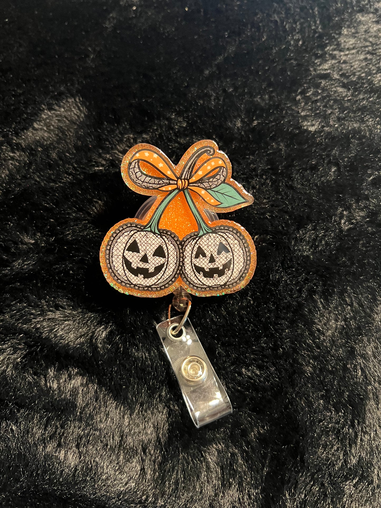 Pumpkin Face Badge Reel