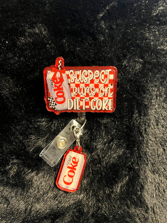 Diet CC Soda Badge Reel